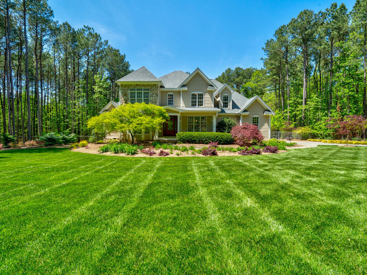 House and landscaped lawn